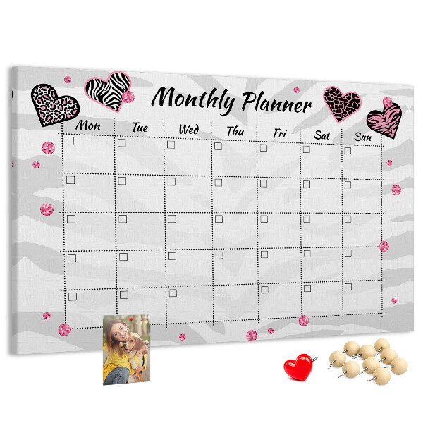 Tablero de anuncios planificador mensual con diseño de corazones y patrones