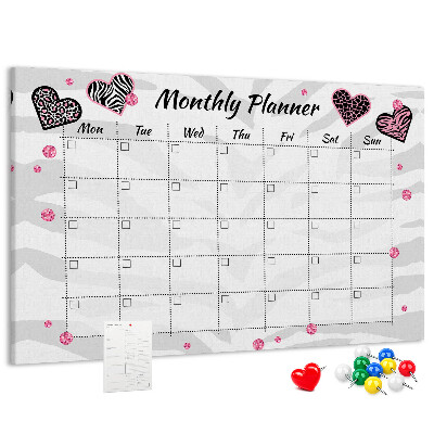 Tablero de anuncios planificador mensual con diseño de corazones y patrones