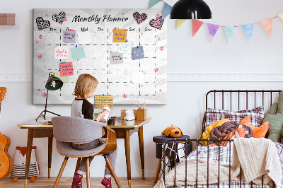 Tablero de anuncios planificador mensual con diseño de corazones y patrones