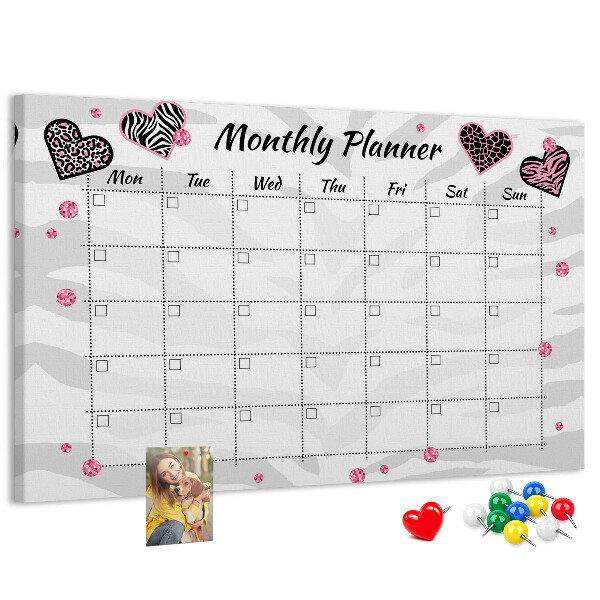 Tablero de anuncios planificador mensual con diseño de corazones y patrones