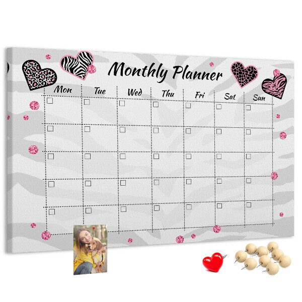 Tablero de anuncios planificador mensual con diseño de corazones y patrones