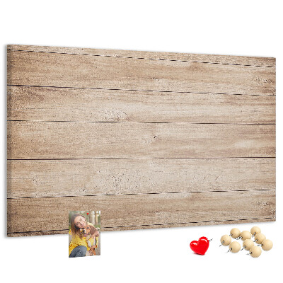 Tablero de corcho decorado de madera natural en tonos cálidos