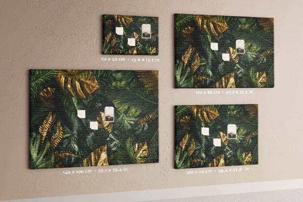 Tablero de corcho decorado con diseño de hojas doradas sobre fondo verde oscuro