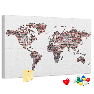 Tablero de anuncios El mundo con el telón de fondo de una pared de ladrillos.