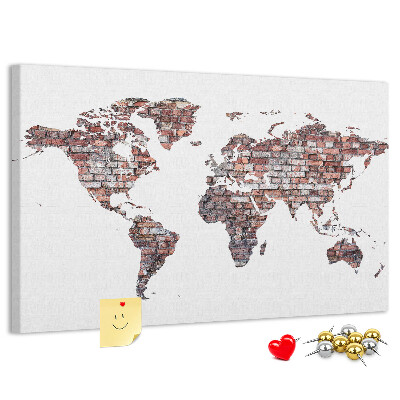 Tablero de anuncios mapamundi con fondo de pared de ladrillos