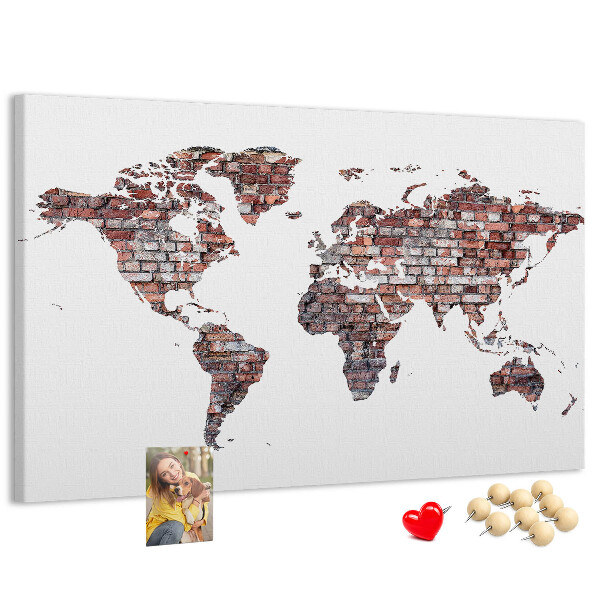 Tablero de anuncios mapamundi con fondo de pared de ladrillos