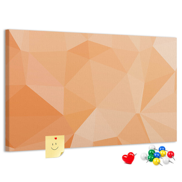 Pizarra de corcho con diseño de triángulos en tonos geométricos naranja