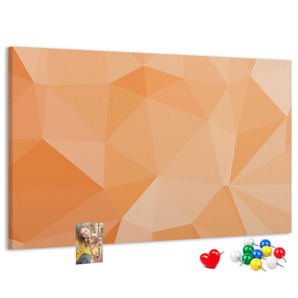 Pizarra de corcho con diseño de triángulos en tonos geométricos naranja