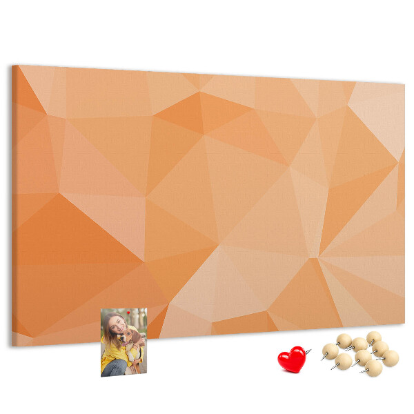 Pizarra de corcho con diseño de triángulos en tonos geométricos naranja