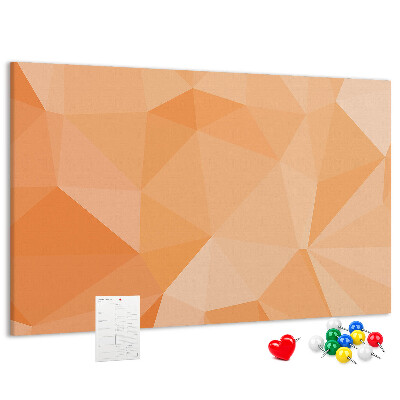Pizarra de corcho con diseño de triángulos en tonos geométricos naranja
