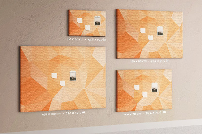 Pizarra de corcho con diseño de triángulos en tonos geométricos naranja
