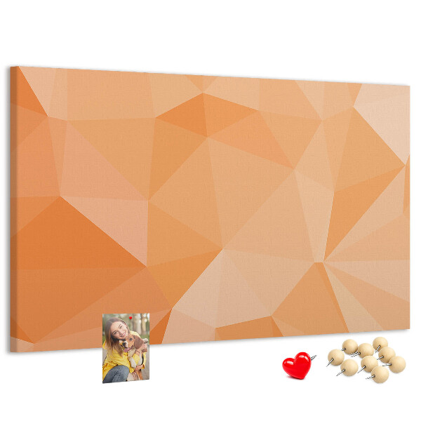 Pizarra de corcho con diseño de triángulos en tonos geométricos naranja