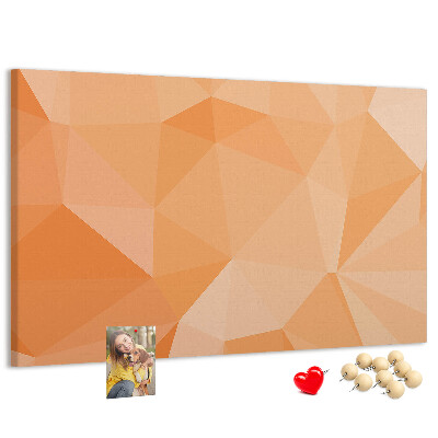 Pizarra de corcho con diseño de triángulos en tonos geométricos naranja