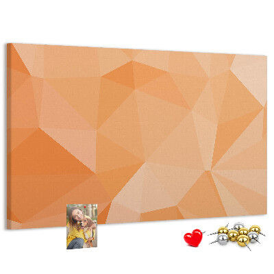 Pizarra de corcho con diseño de triángulos en tonos geométricos naranja