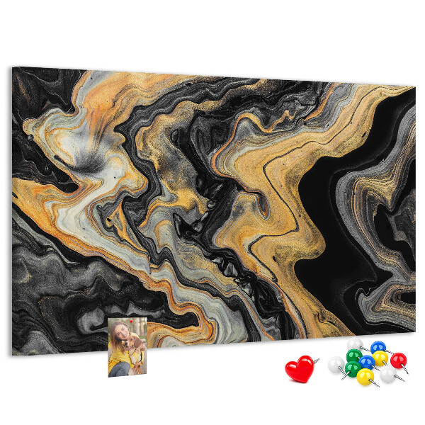 Tablero de corcho decorado con patrón abstracto de olas doradas y negras