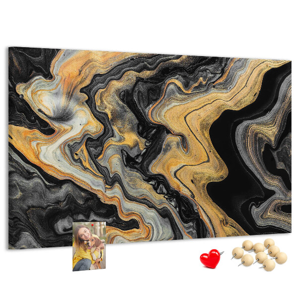 Tablero de corcho decorado con patrón abstracto de olas doradas y negras