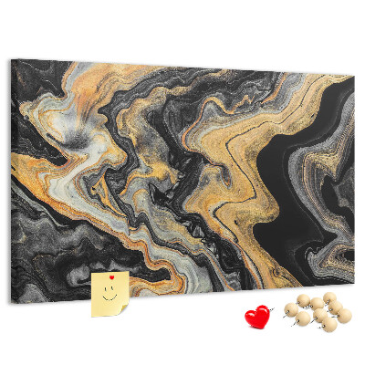 Tablero de corcho decorado con patrón abstracto de olas doradas y negras