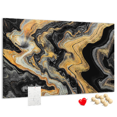 Tablero de corcho decorado con patrón abstracto de olas doradas y negras