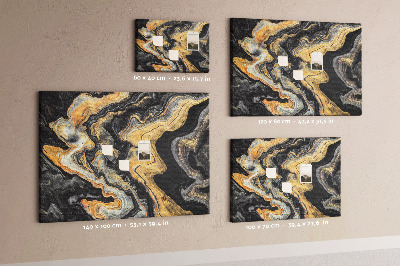 Tablero de corcho decorado con patrón abstracto de olas doradas y negras