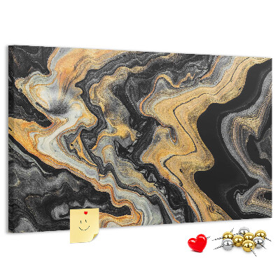 Tablero de corcho decorado con patrón abstracto de olas doradas y negras