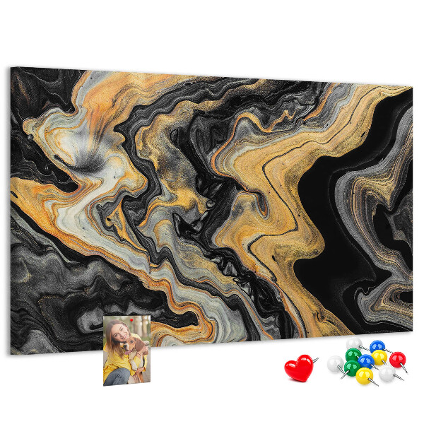 Tablero de corcho decorado con patrón abstracto de olas doradas y negras