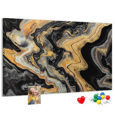 Tablero de corcho decorado con patrón abstracto de olas doradas y negras