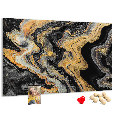 Tablero de corcho decorado con patrón abstracto de olas doradas y negras