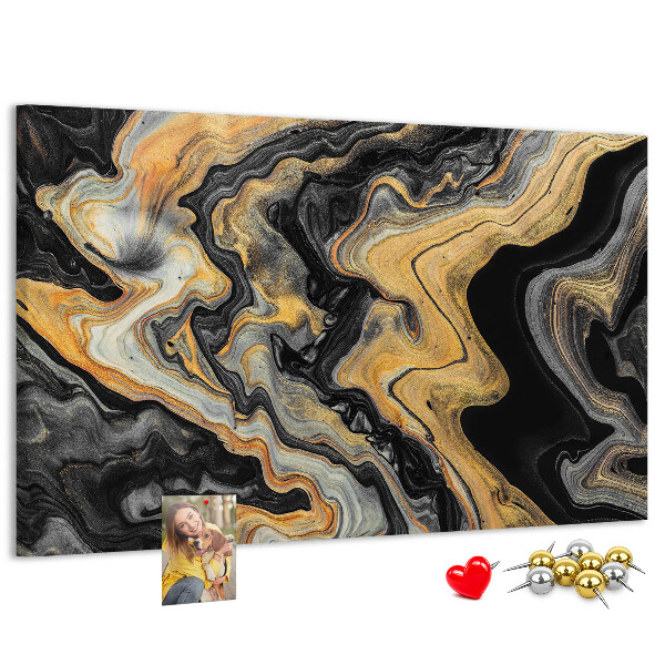 Tablero de corcho decorado con patrón abstracto de olas doradas y negras