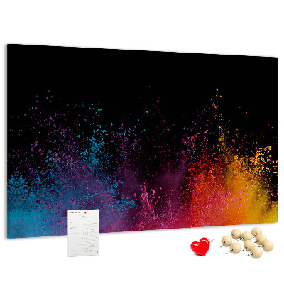 Tablero de corcho decorado una explosión de colores sobre un fondo negro