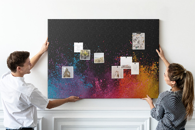 Tablero de corcho decorado una explosión de colores sobre un fondo negro