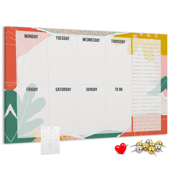 Tablero de corcho decorado con diseño de calendario floral y detalles coloridos