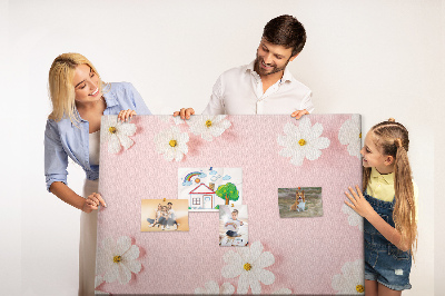 Pizarra de corcho con estampado floral sobre fondo rosa