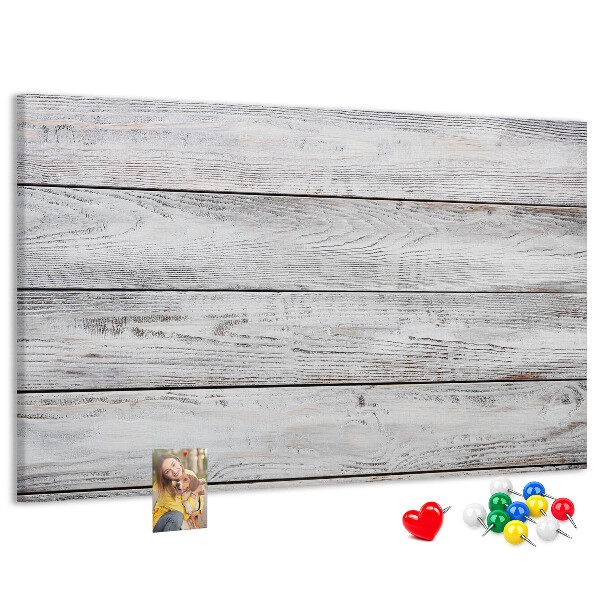 Tablero de anuncios de madera rústica con acabado blanco