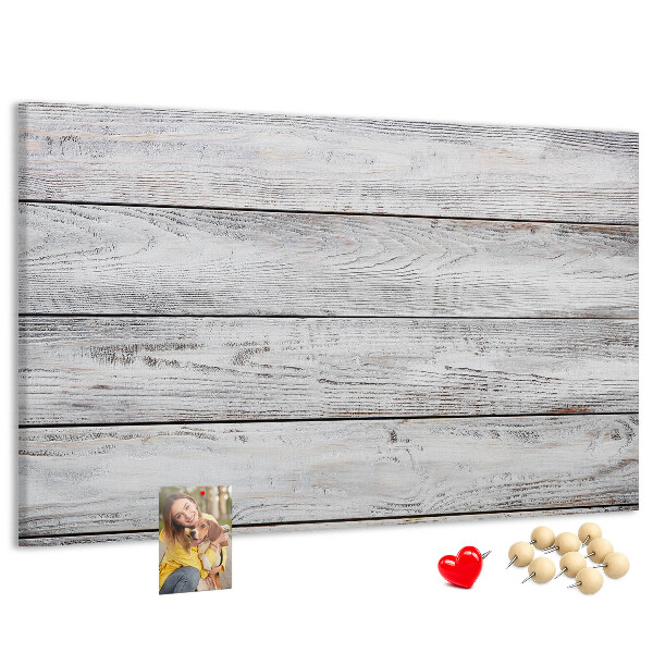 Tablero de anuncios de madera rústica con acabado blanco