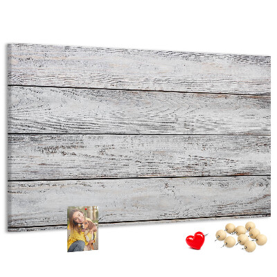 Tablero de anuncios de madera rústica con acabado blanco