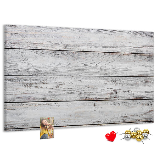 Tablero de anuncios de madera rústica con acabado blanco