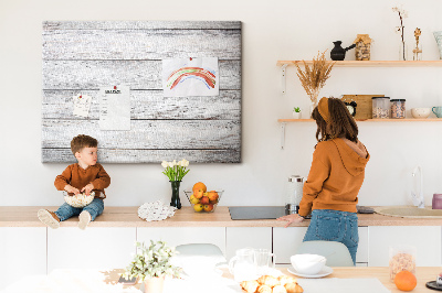Tablero de anuncios de madera rústica con acabado blanco