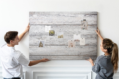 Tablero de anuncios de madera rústica con acabado blanco