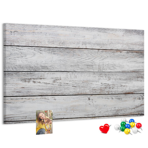 Tablero de anuncios de madera rústica con acabado blanco