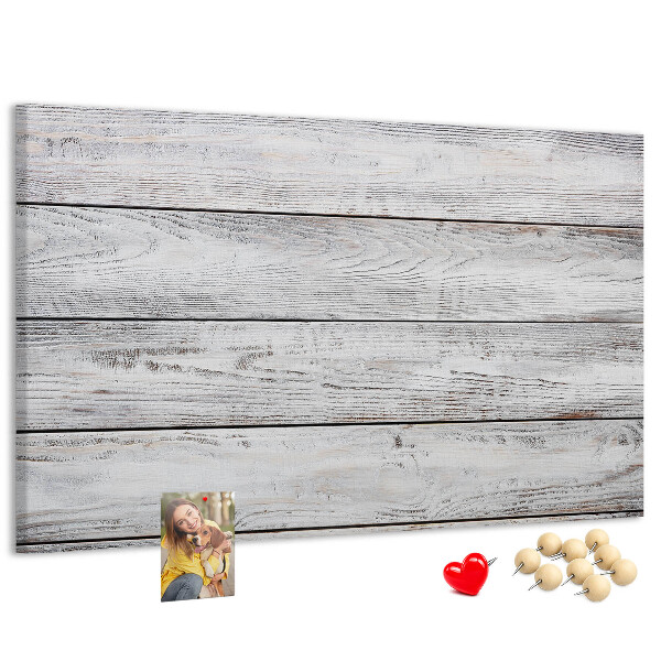 Tablero de anuncios de madera rústica con acabado blanco