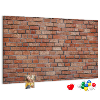 Pizarra de corcho con diseño de pared de ladrillo en tonos cálidos