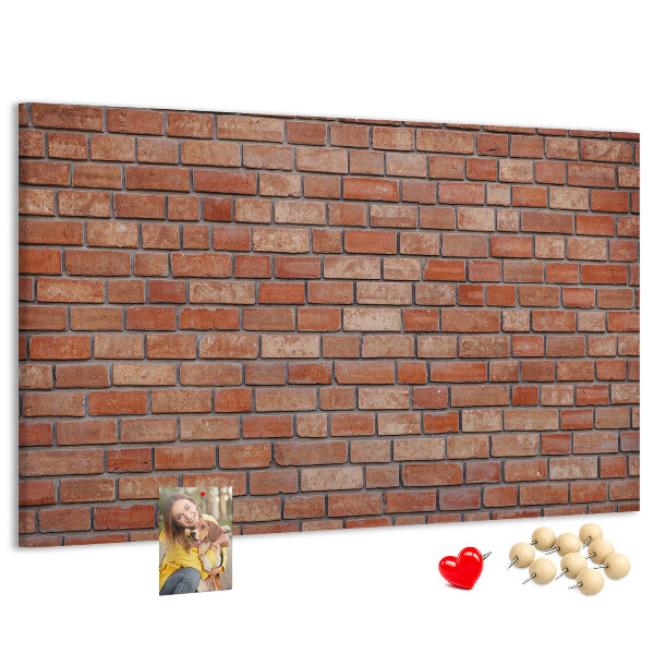 Pizarra de corcho con diseño de pared de ladrillo en tonos cálidos