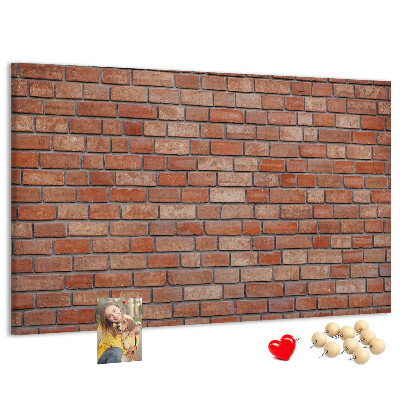 Pizarra de corcho con diseño de pared de ladrillo en tonos cálidos