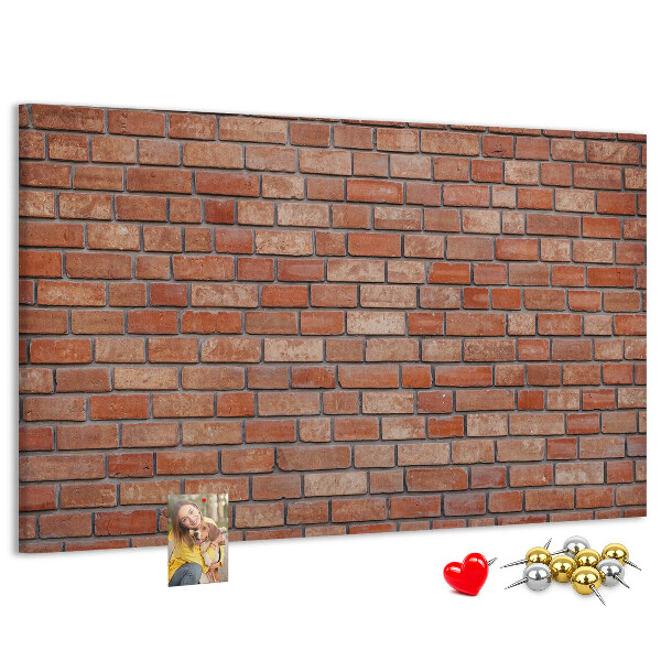 Pizarra de corcho con diseño de pared de ladrillo en tonos cálidos