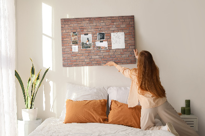 Pizarra de corcho con diseño de pared de ladrillo en tonos cálidos