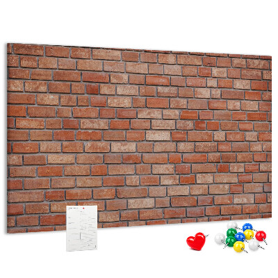 Pizarra de corcho con diseño de pared de ladrillo en tonos cálidos