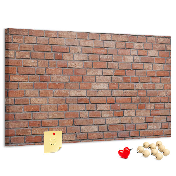 Pizarra de corcho con diseño de pared de ladrillo en tonos cálidos