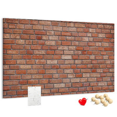 Pizarra de corcho con diseño de pared de ladrillo en tonos cálidos