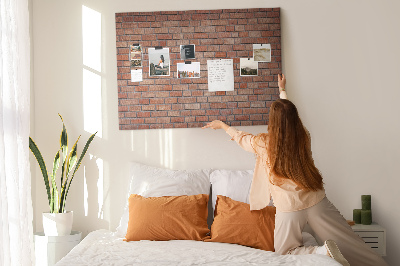 Pizarra de corcho con diseño de pared de ladrillo en tonos cálidos