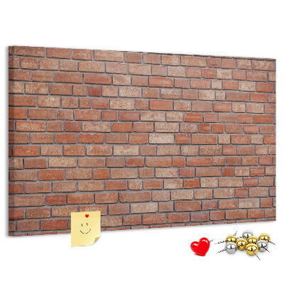 Pizarra de corcho con diseño de pared de ladrillo en tonos cálidos